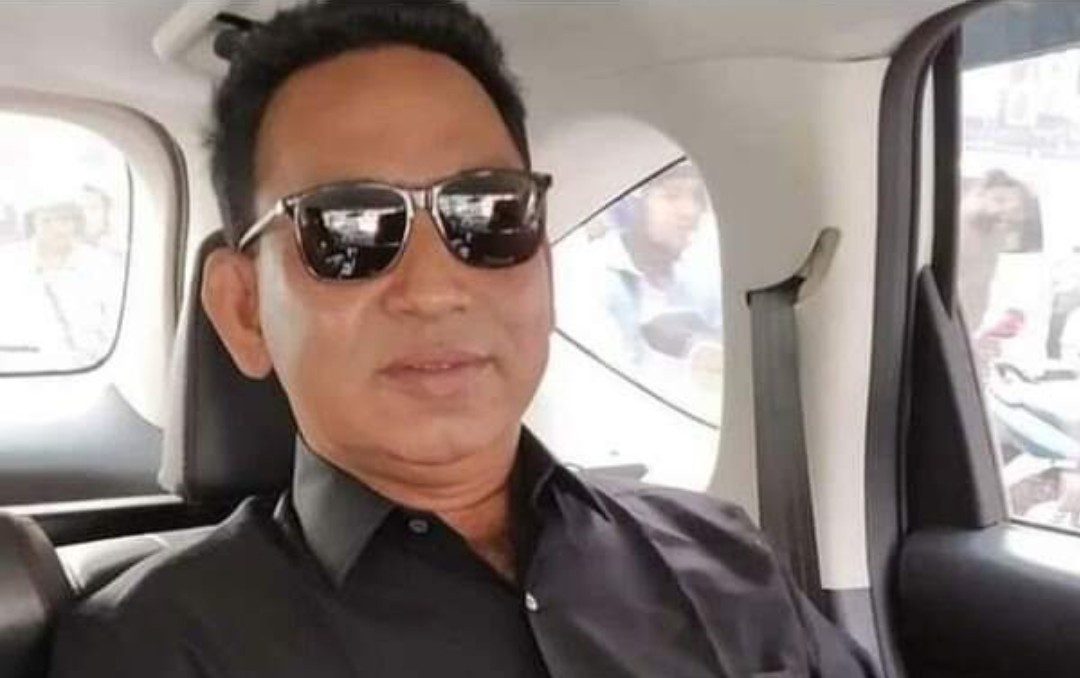 স্ত্রীর পিটুনিতে আহত  মাদারীপুর জেলা আ’লীগের সাংগঠনিক সম্পাদক  ইলিয়াস আহমদ। 